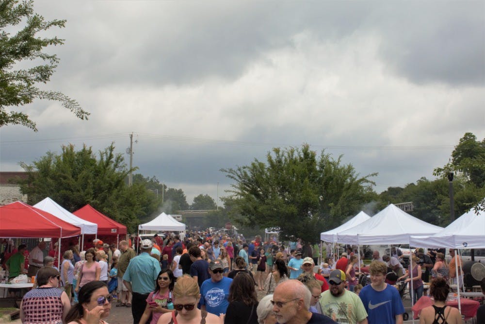 Community members&nbsp;gathered in downtown Opelika to taste test 25 different burgers at Burger Wars on Saturday, June 2, in Opelika, Ala.&nbsp;