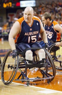 Woody Thornton defends the basket during halftime of the men's basketball game against South Carolina in Auburn Arena. (Courtesy of Jimmy Rhyne)