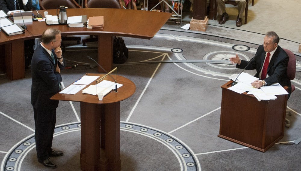Embattled Alabama Chief Justice Roy Moore answers questions from his lawyer Philip Jauregui during Moore's ethics trial at the Alabama Judicial Building in Montgomery, Ala., on Wednesday September 28, 2016.