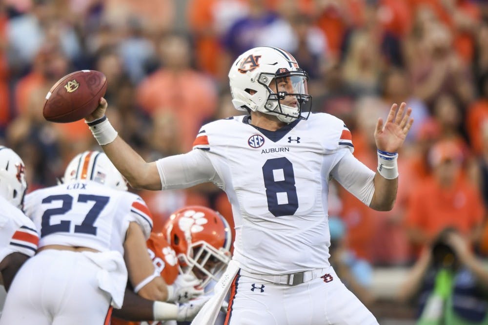 <p>Auburn quarterback Jarrett Stidham (8) will need to carve up Washington's elite secondary if the Tigers are to find offensive success this weekend.&nbsp;</p>