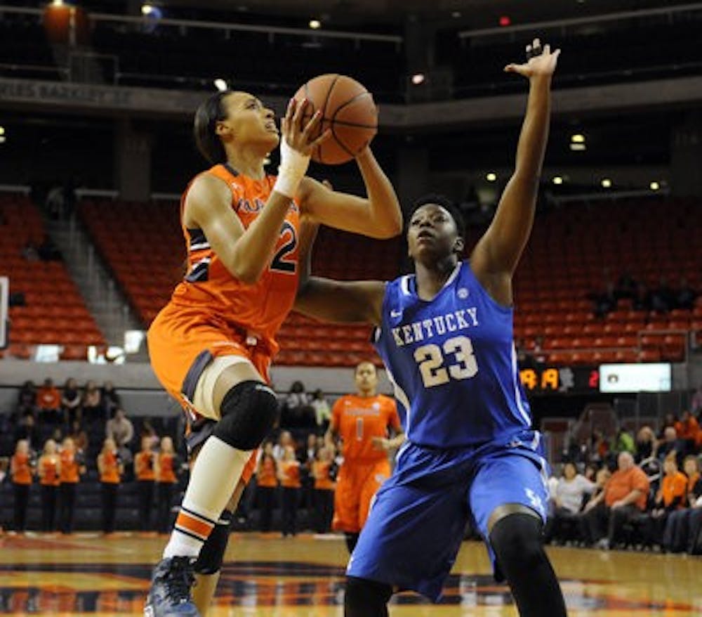 Auburn's Tyrese Tanner shoots over Kentucky's Samarie Walker in the first half of their basketball game on Sunday, January 19, 2014. (Contributed by Anthony Hall)