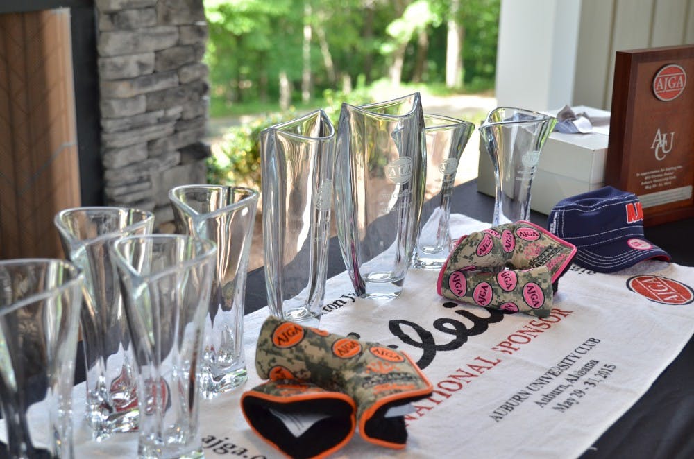 Trophies were awarded to the winners of each division concluding the Will Claxton Junior Tournament. Graysen Huff took the first place trophy in the men’s division. (Raye May | Managing Editor) 