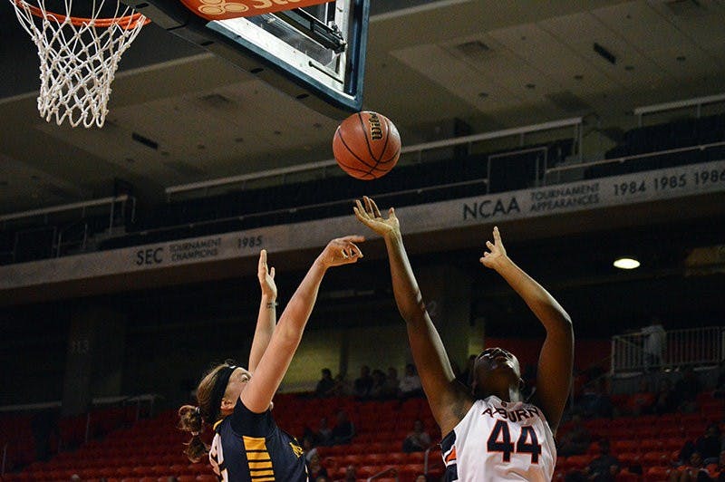 Auburn's Tra'Cee Tanner #44 attempts to make goal in first half. Marquette vs Auburn at Auburn, AL. Dec 2, 2014. (Emily Enfinger | Assistant Photo Editor)
