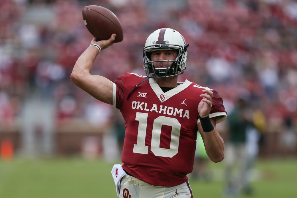 <p>Redshirt sophomore quarterback Austin Kendall warms up before the game against Baylor Sept. 29. Courtesy of Caitlyn Epes/The OU Daily.</p>