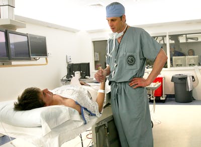 Murphey Coy consults Dr. Mark Bonnell before his surgery on April 9, 2009, at the Gill Heart Institute in Lexington, Ky. (Courtesy of Allie Garza of the The Kentucky Kernal)