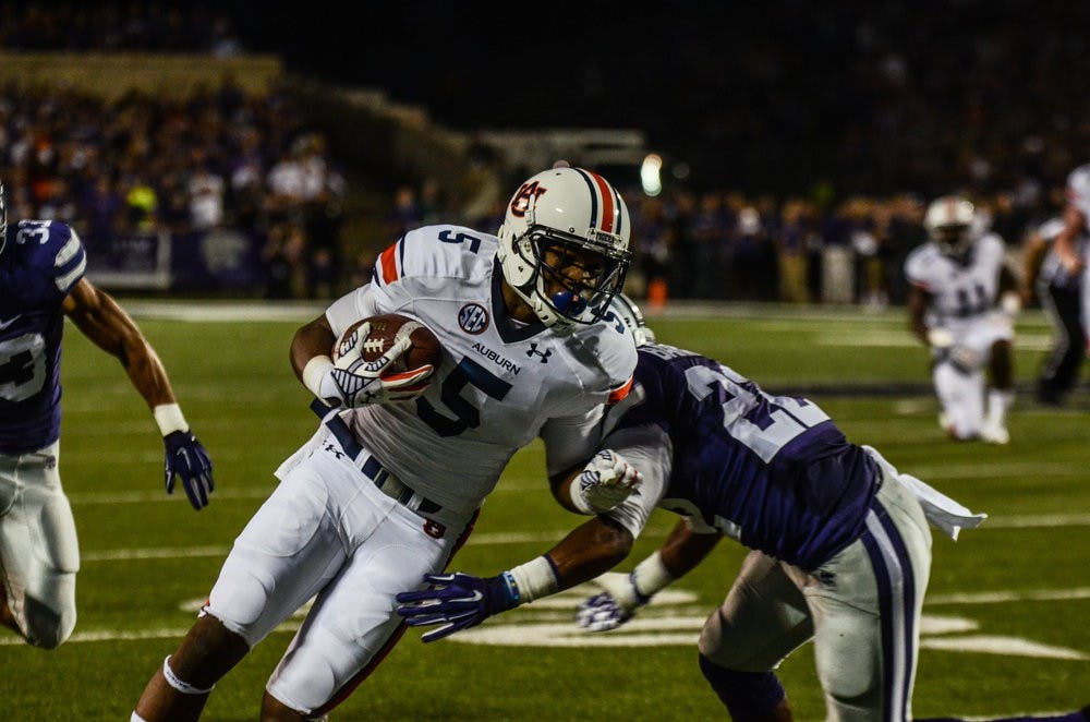Ricardo Louis runs the ball for a touchdown against Kansas State.

Raye May / PHOTO EDITOR