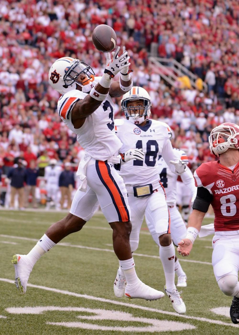 <p>Jonathan Jones (3) can't quite haul in a would-be interception in the first half.Auburn vs Arkansas on Saturday, October 24, 2015 in Fayetteville, AR.</p>