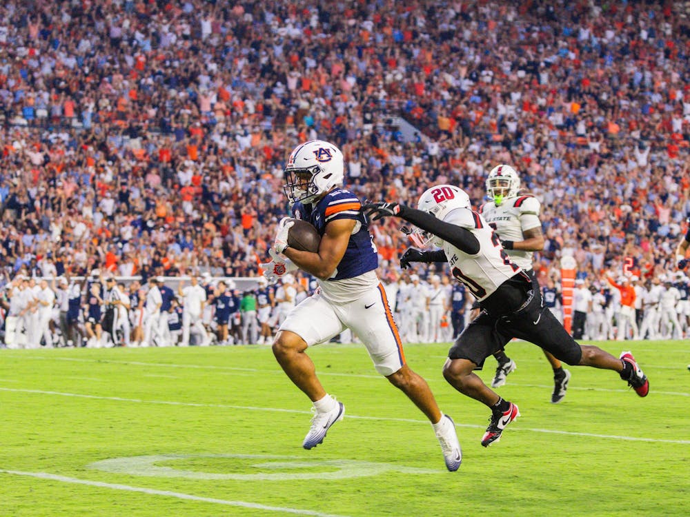 Jeremiah Cobb breaks a tackle and scores Auburn's first touchdown of the night during Auburn vs Ball State on Sept. 6, 2025. 