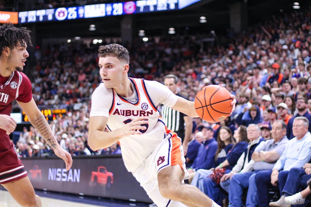 <p>Filip Jović makes a rush toward the basket during the game against South Carolina on Jan. 17, 2026 in Neville Arena in Auburn, Ala. </p>