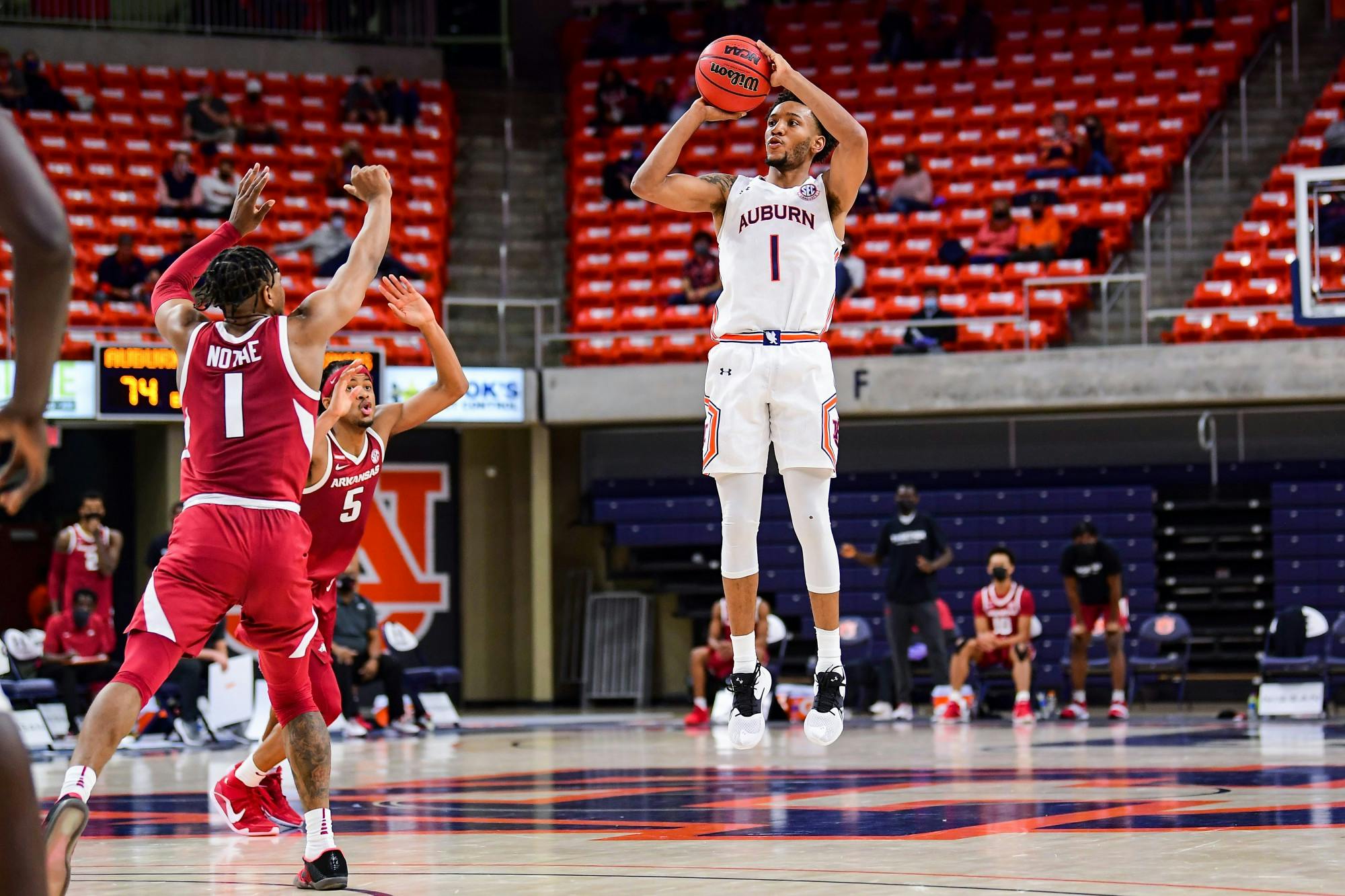 123020_Auburn_SL1_7185_Jamal Johnson shoots a three .JPG
