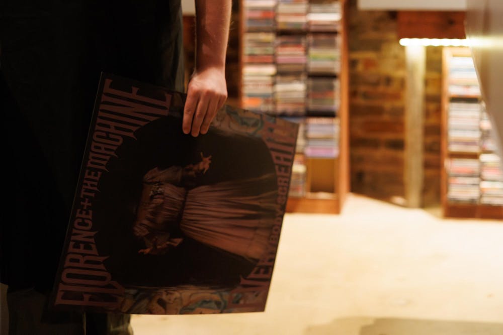 <p>10000 HZ Records in Opelika, Ala., hands out posters of the new album 'Everybody Scream' by Florence and the Machine the evening of Friday, Oct. 31, 2025.</p>