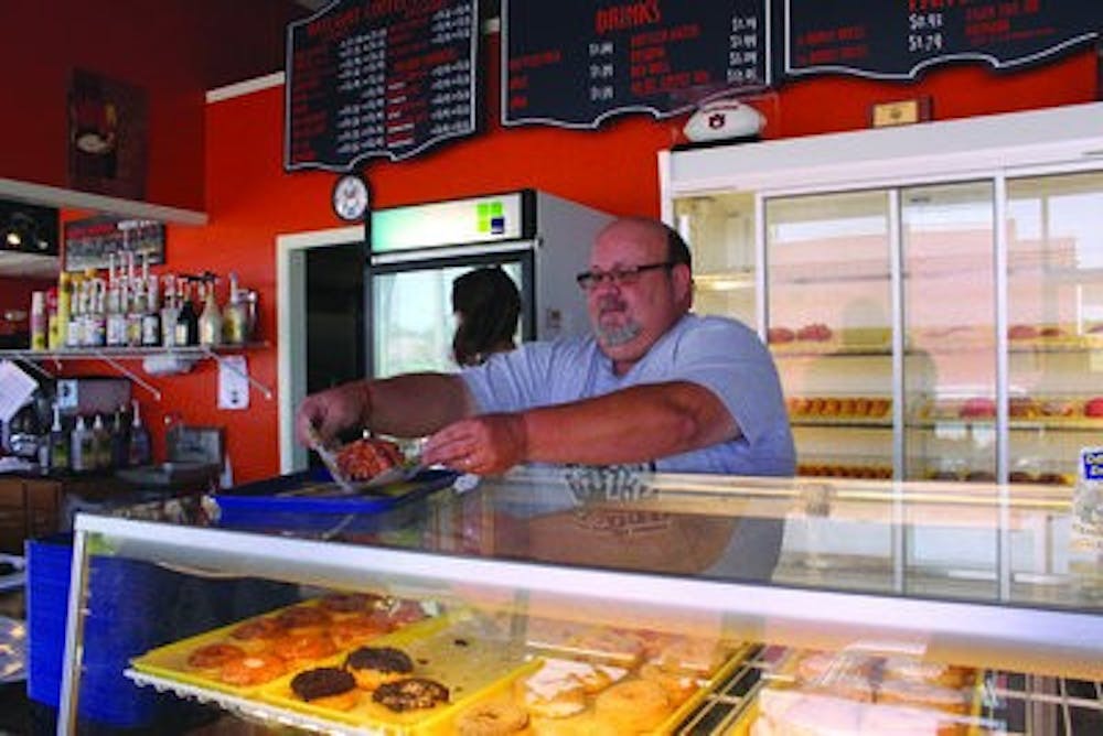 Bill Springer, owner of Daylight Donuts, said taking care of customers is high-priority. (Alex Sager / ASSOCIATE PHOTO EDITOR)