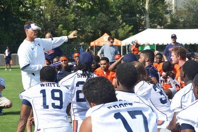Gene Chizik tells his players what he expects during the season's first practice at the Auburn Athletic Complex. (Danielle Lowe / PHOTO EDITOR)