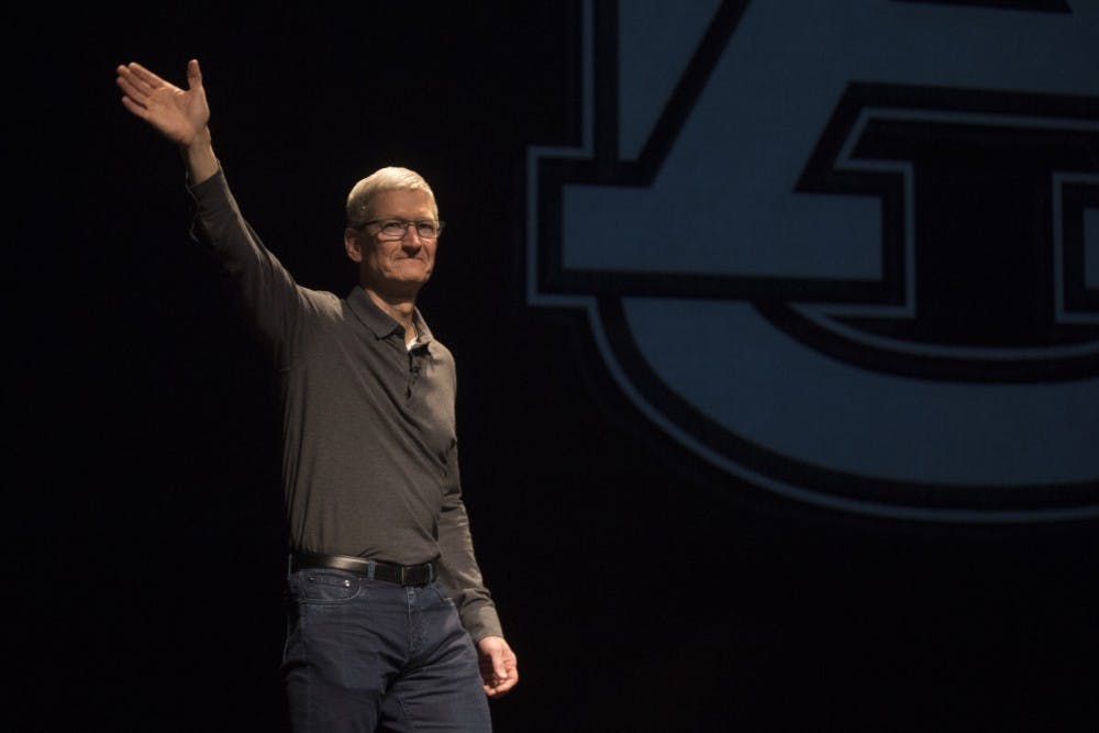 Tim Cook, Apple CEO and Auburn alumnus, walks onto the stage at the Telfair B. Peet Theatre, on Thursday, April 5, 2017 in Auburn, Ala. 