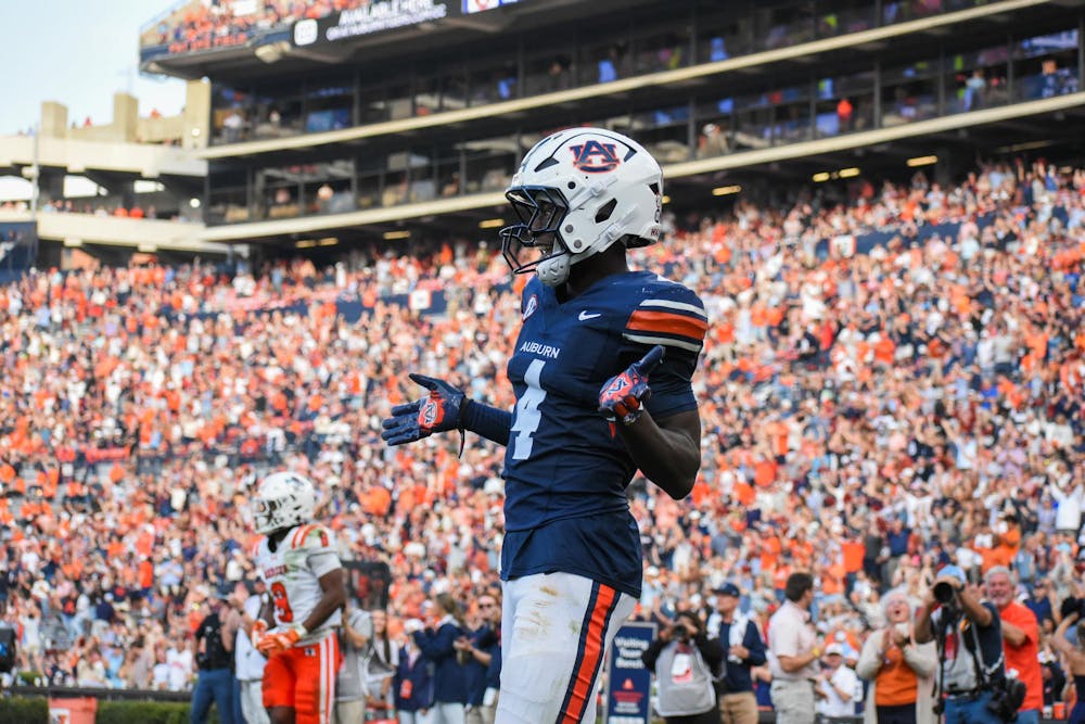 <p>Malcolm Simmons (4) celebrates touchdown against Mercer in Jordan - Hare Stadium on November 22, 2025.</p>