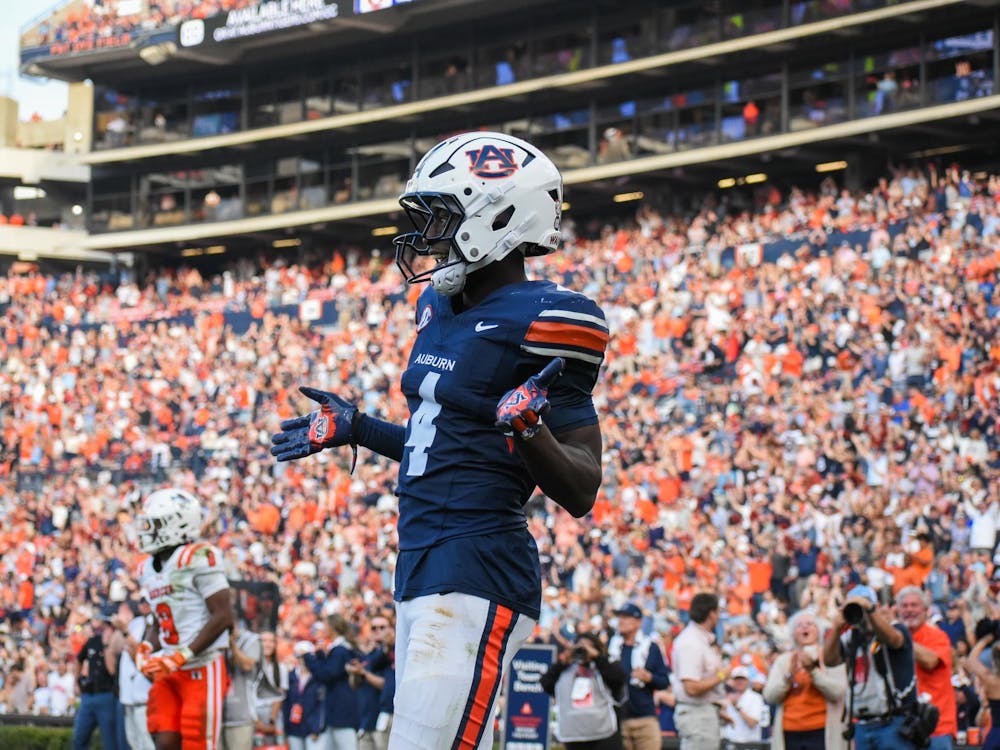 Malcolm Simmons (4) celebrates touchdown against Mercer in Jordan - Hare Stadium on November 22, 2025.
