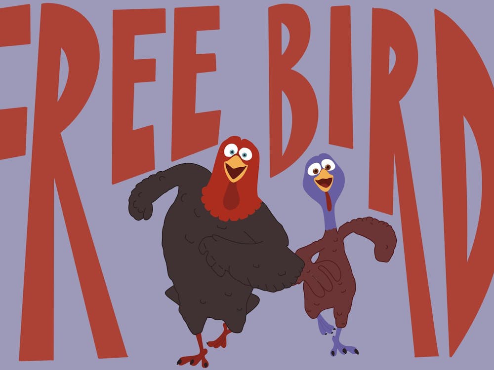 Two cartoon turkeys, one black and one purple, joyfully dance beside large, bold red letters spelling "FREE BIRDS" against a light purple background.