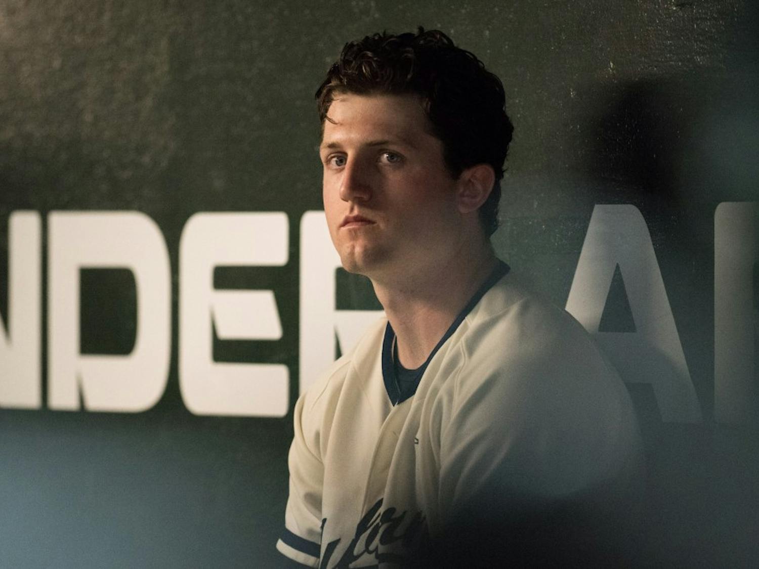 Casey Mize sits in the dugout during Auburn vs. Vanderbilt baseball on Friday, May 4, 2018, in Auburn, Ala.