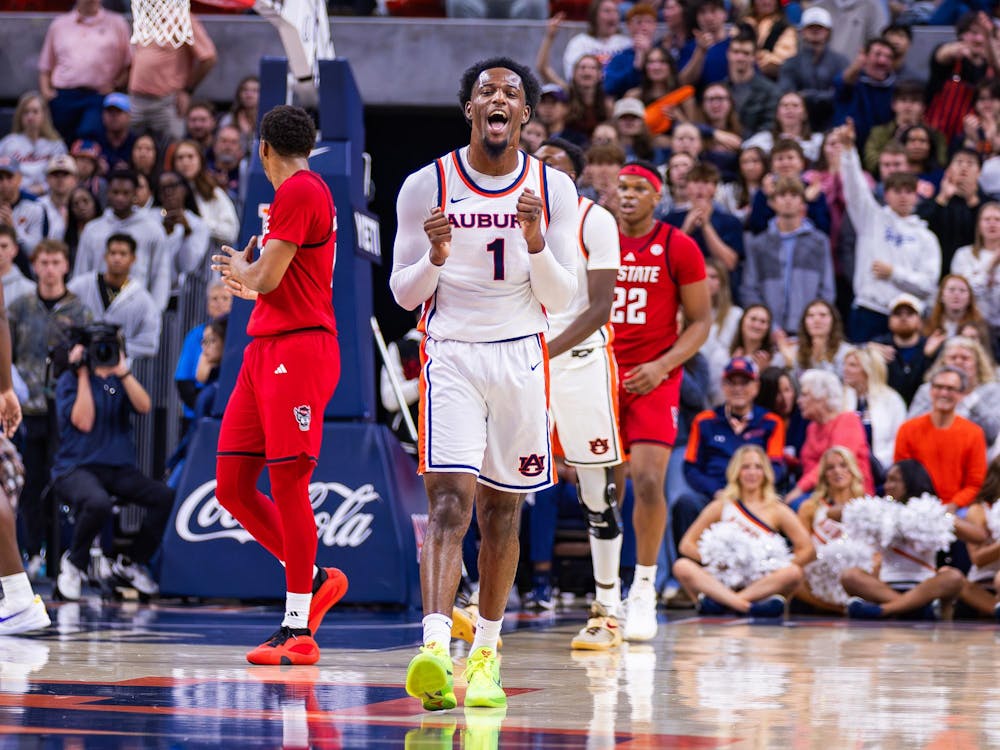 Kevin Overton reacts after a defensive stop against North Carolina State at Neville Arena on Dec. 3, 2025.