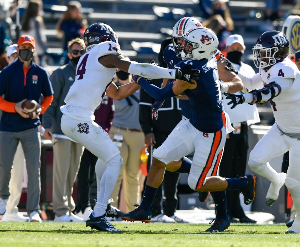 <p>Dec. 5, 2020; Auburn AL, USA; Anthony Schwartz (1) with the big gain off of the jet sweep during the game between Auburn and Texas A&amp;M at Jordan Hare Stadium. Mandatory Credit: Todd Van Emst/AU Athletics</p>