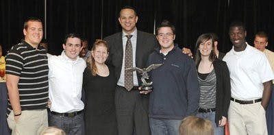 Coach Barbee congratulates students from The Jungle at the basketball awards banquet Sunday. (Courtesy of Shanna Lockwood)