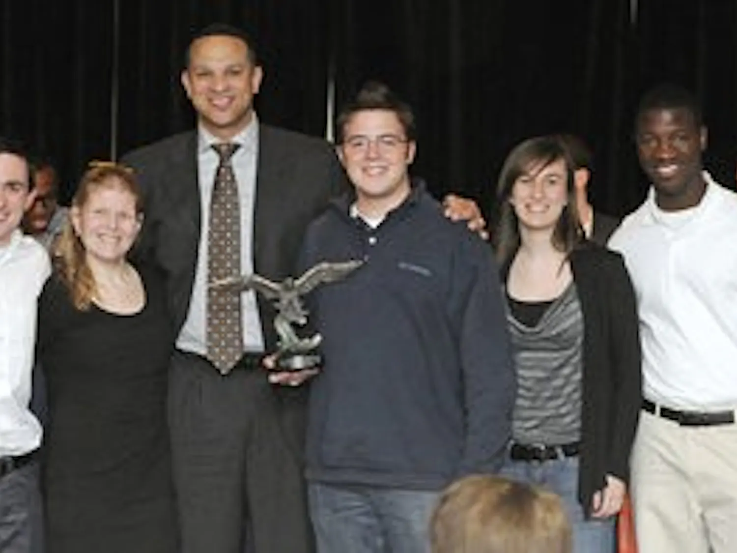 Coach Barbee congratulates students from The Jungle at the basketball awards banquet Sunday. (Courtesy of Shanna Lockwood)