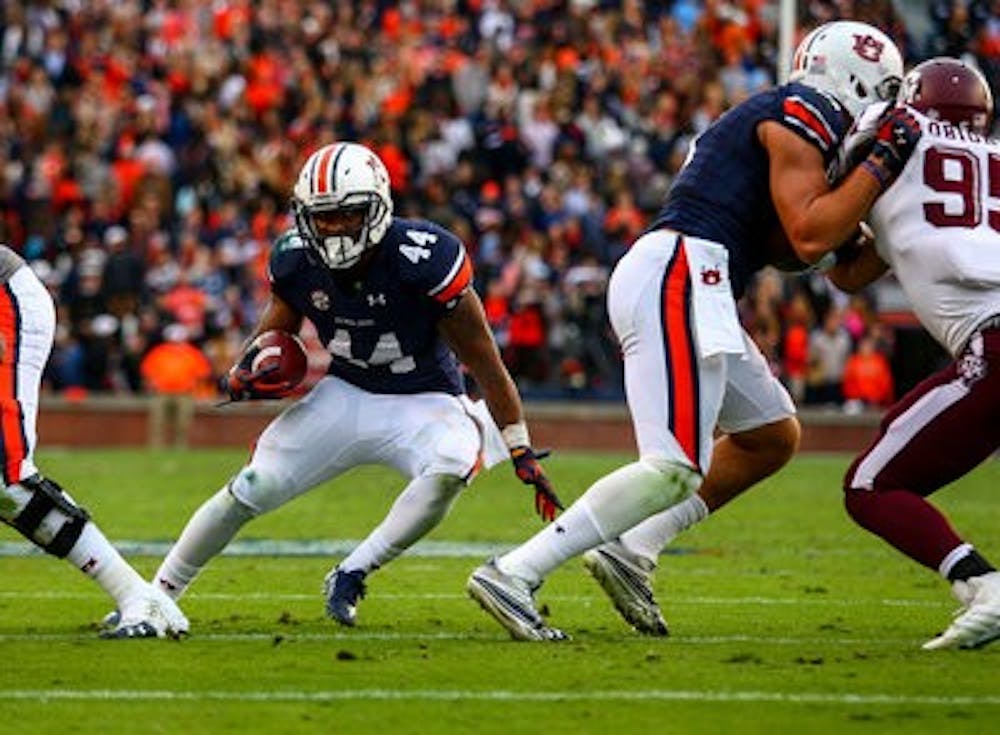 Cameron Artis-Payne has eclipsed 1,000 yards rushing on the season. (Kenny Moss | Photographer)
