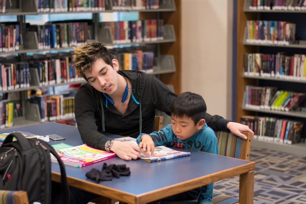A student in the Esperanza program studies at the Auburn Public Library on Tuesday, March 20, 2018.