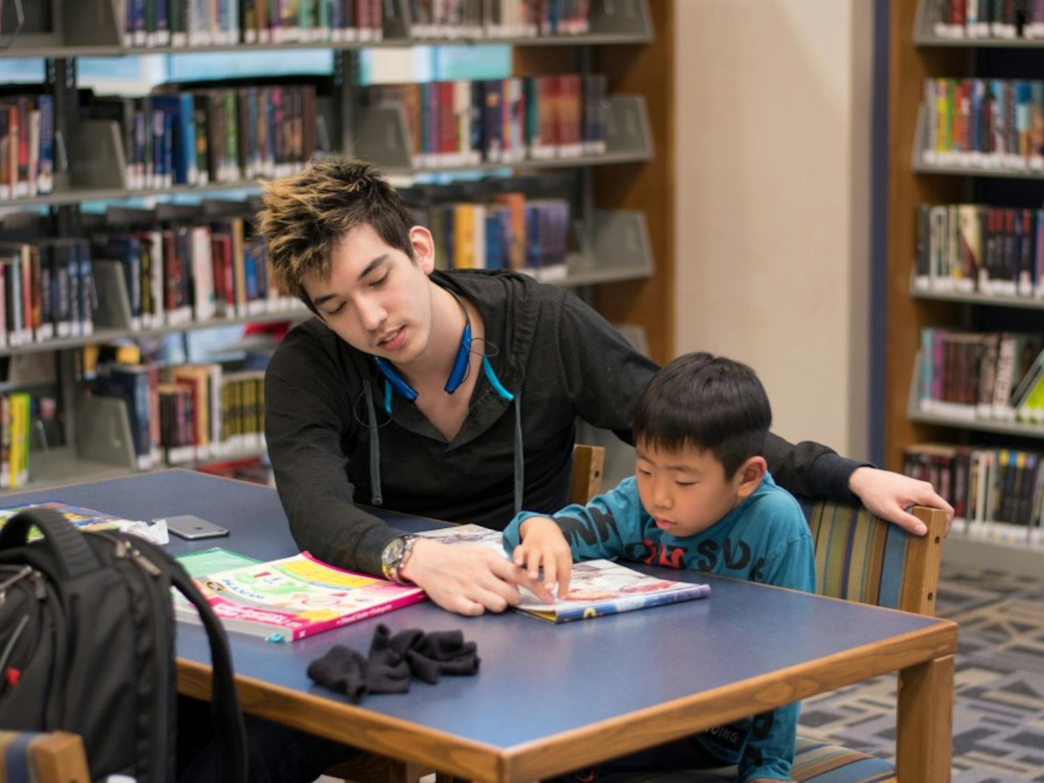 A student in the Esperanza program studies at the Auburn Public Library on Tuesday, March 20, 2018.