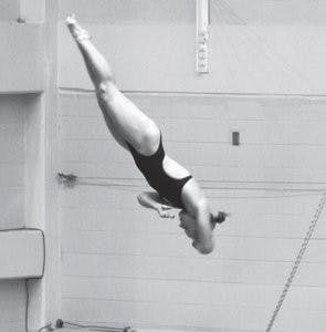 Shanna Schuelein dives against LSU Saturday, Oct. 20. (Katherine McCahey / PHOTOGRAPHER)