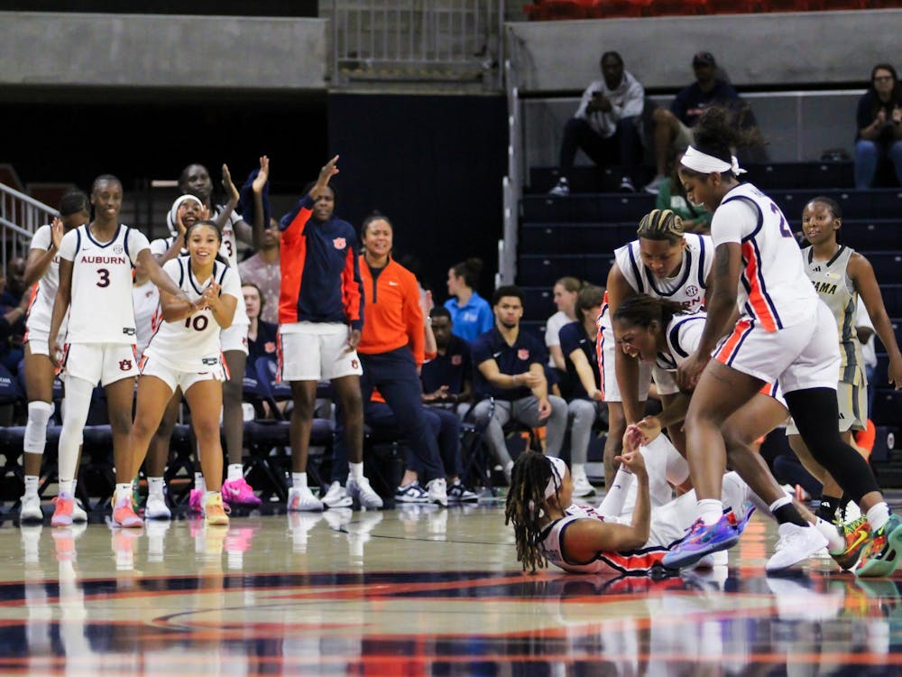 <p>The Auburn Women's Basketball team celebrates Mya Petticord after she makes a three pointer and gets fouled by Alabama State at Neville Arena in Auburn, Ala. on Nov. 8, 2025.</p>