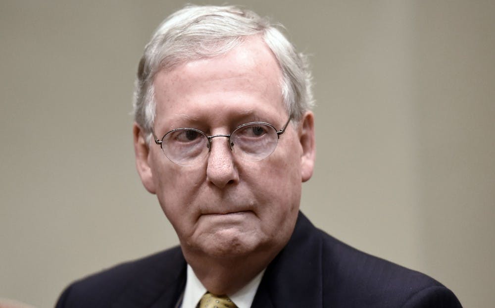 <p>Senate Majority Leader Mitch McConnell listens during a meeting with President Donald Trump on June 6, 2017 in the Roosevelt Room of the White House in Washington, D.C. (Olivier Douliery/Abaca Press/TNS)</p>
