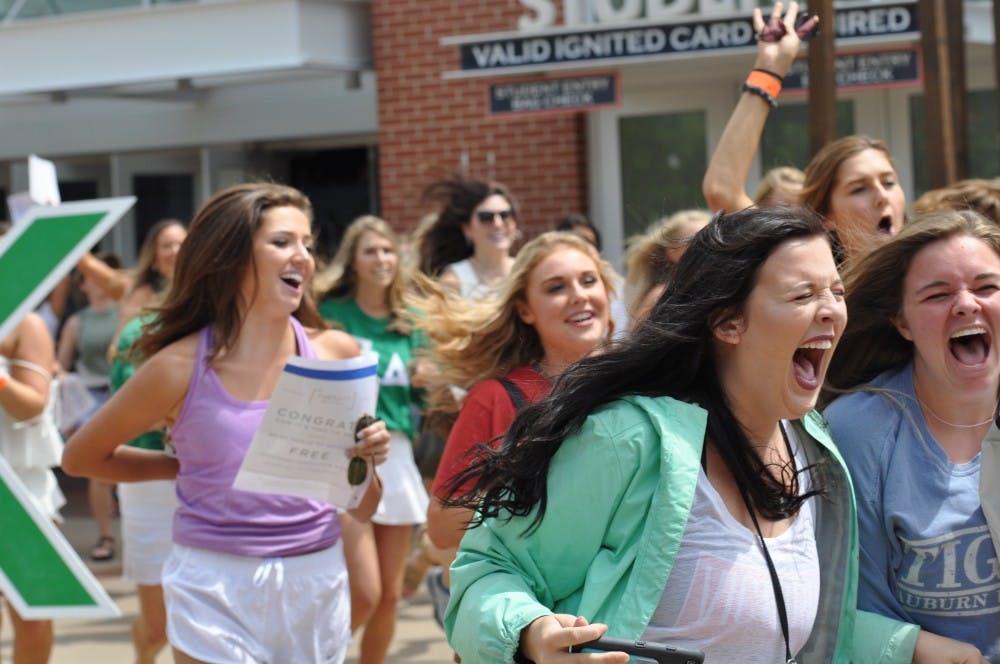 Flooding out of the arena in excitement for Bid Day on August 17, 2018.