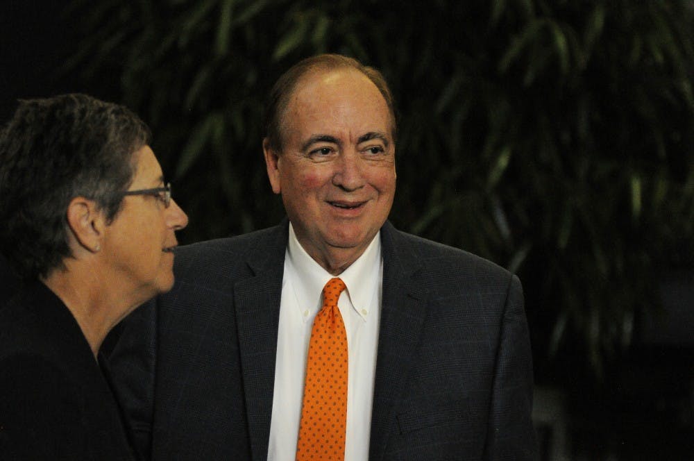 Former Auburn University President Jay Gogue greets guests&nbsp;during a reception celebrating his&nbsp;legacy on Tuesday, May 23, 2017 in Auburn, Ala.