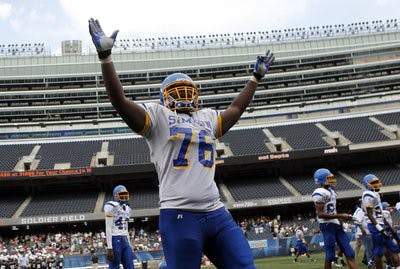 Simeon High School's Jordan Diamond celebrates a 47-41 win over Mt. Carmel High School at Soldier Field in Chicago on Aug. 29, 2010. (Courtesy of Scott Strazzante, the Chicago Tribune)