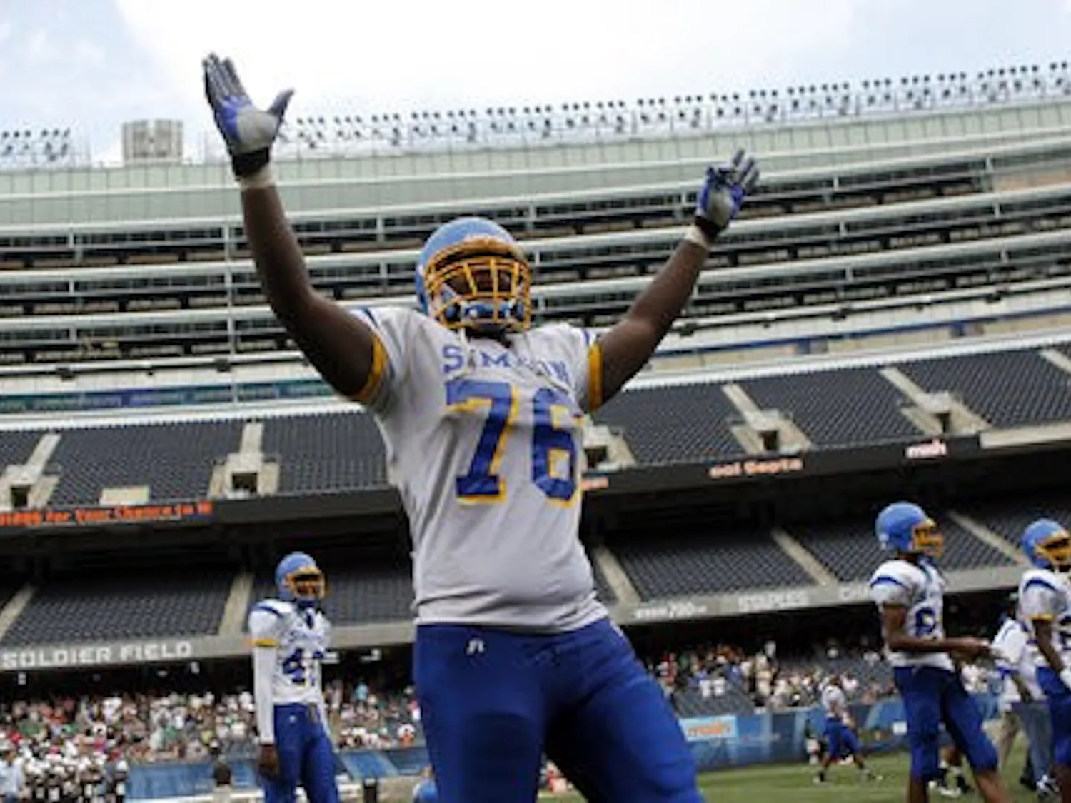 Simeon High School's Jordan Diamond celebrates a 47-41 win over Mt. Carmel High School at Soldier Field in Chicago on Aug. 29, 2010. (Courtesy of Scott Strazzante, the Chicago Tribune)