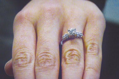 Blakeley Kilgore, junior in art and liberal arts, shows off her engagement ring given to her by her fiance Stephen Morrow. (Emily Enfinger | Assistant Photo Editor)