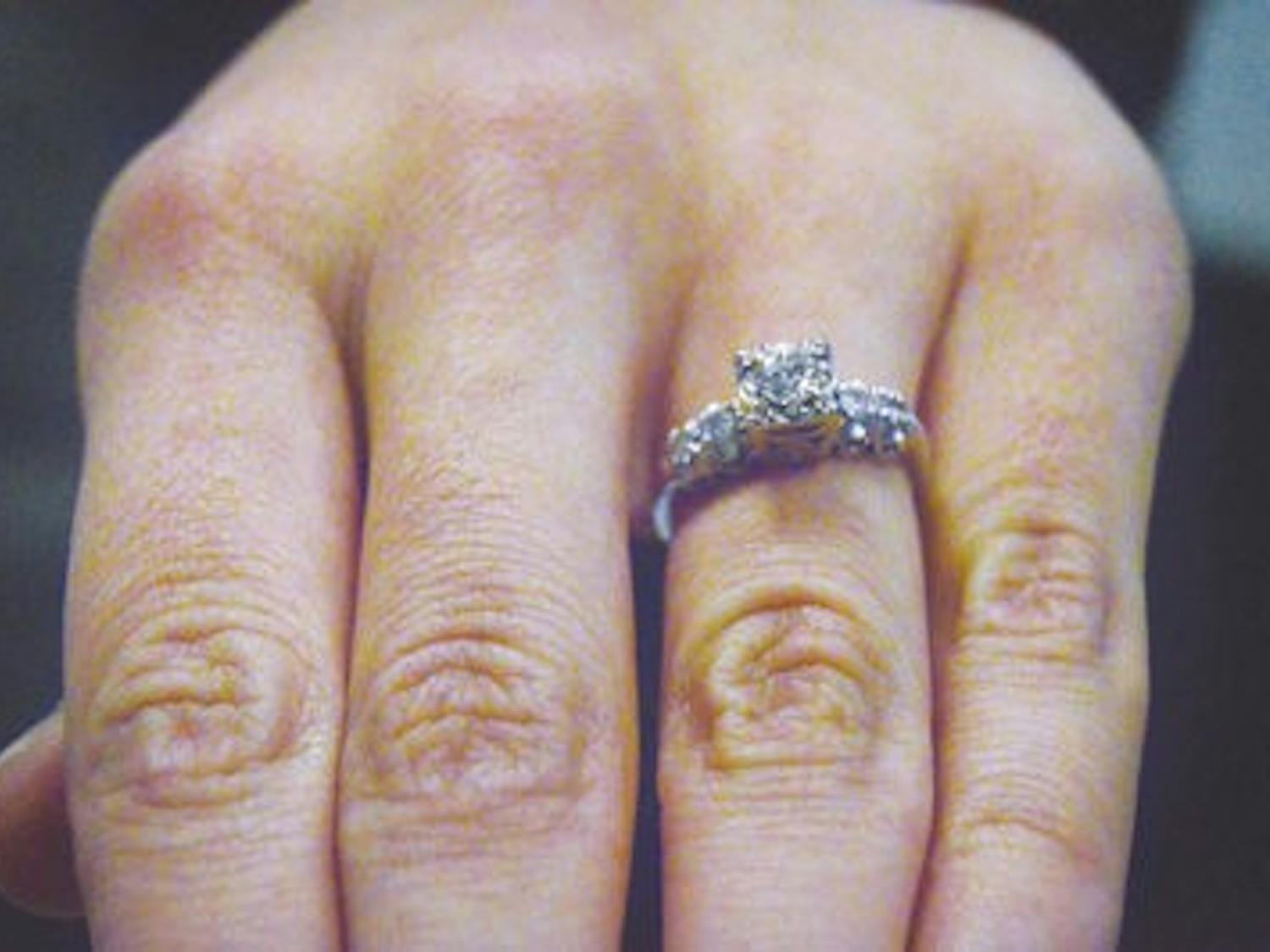 Blakeley Kilgore, junior in art and liberal arts, shows off her engagement ring given to her by her fiance Stephen Morrow. (Emily Enfinger | Assistant Photo Editor)