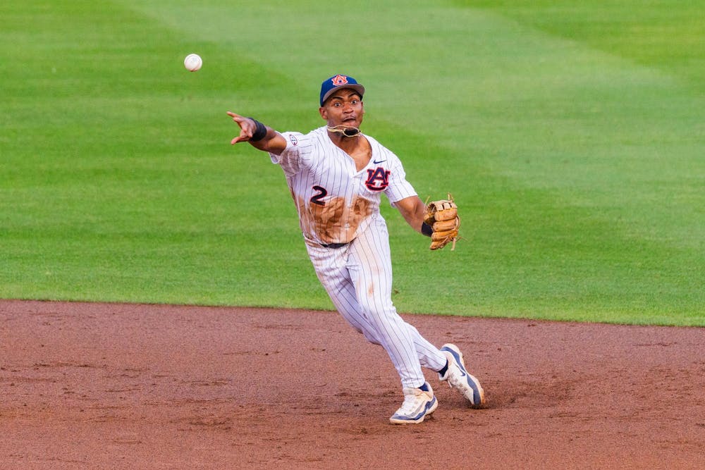 <p>Chris Rembert throws a ground ball to first against Arkansas at Plainsman Park on April 3, 2026.</p>