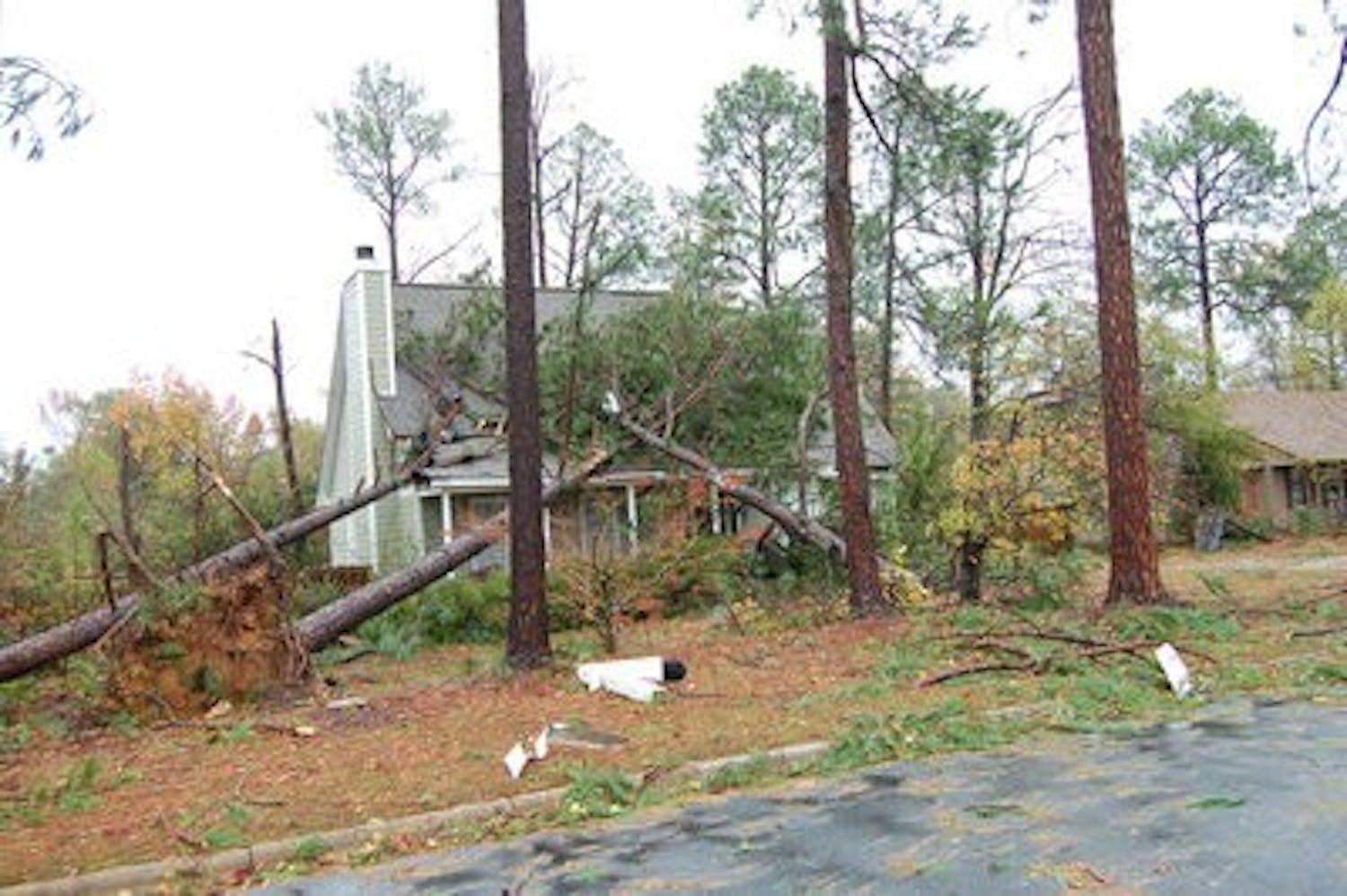 Two tornadoes touched down in Auburn Nov. 16, 2011 damaging approximately 237 structures, like this home on Elkins Drive. The storms also downed about 1,000 trees. Auburn Public Works estimates another 2-3 weeks until all debris is cleared. (Kate Jones / INTRIGUE EDITOR)