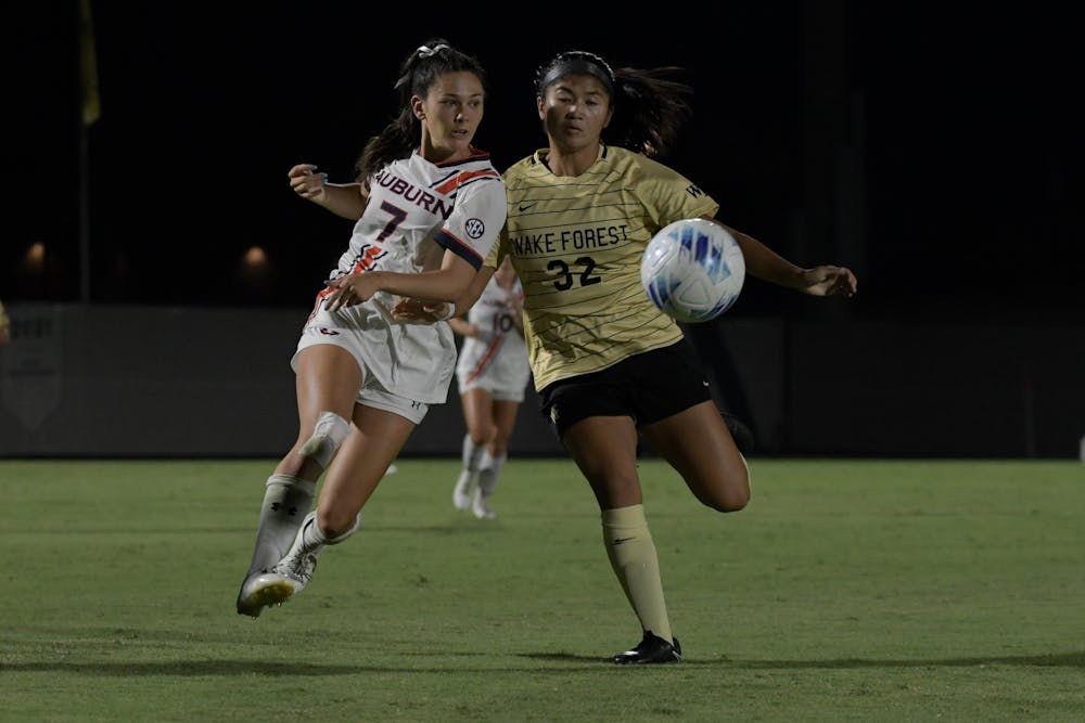 Carly Thatcher (#7) regains control of the ball against Wake Forest at Auburn Soccer Complex on August 31st 2023