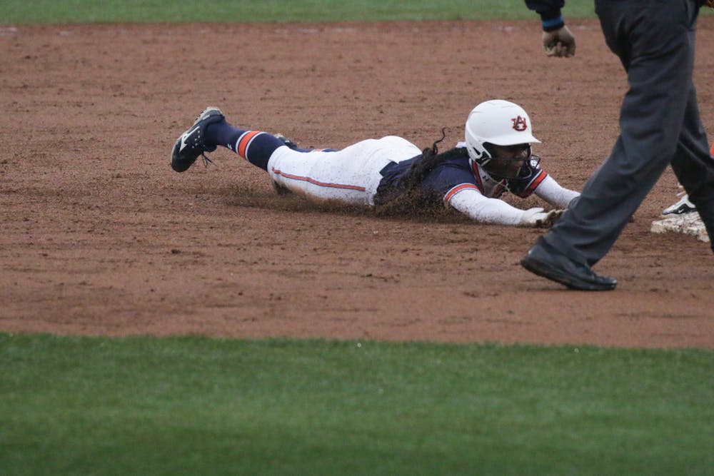 <p>Makayla Packer (#10) steals second base against Virginia Tech at Jane B. Moore Field on February 10th 2024</p>