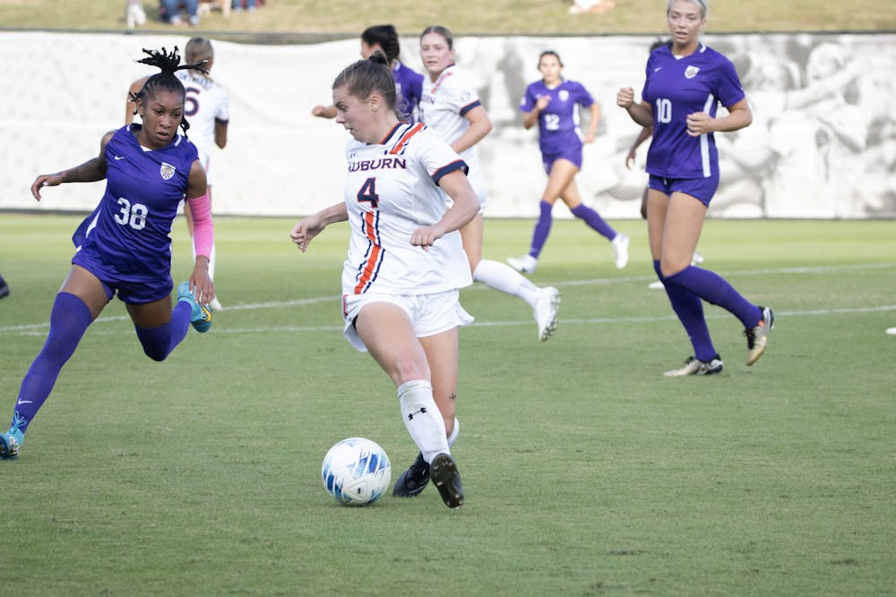 <p>Anna Haddock (#4) dribbles versus LSU at the Auburn Soccer Complex on October 22nd, 2023.</p>