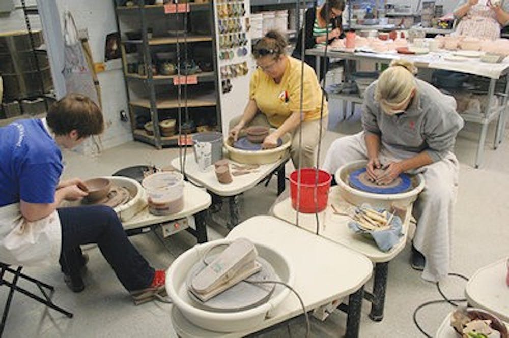Auburn Parks and Recreation's ceramics studio members work to created handmade ceramic bowls for the Second Annual Empty Bowls Event to raise money for the Food Bank of East Alabama. Tickets can be purchased for $20. (Contributed by Cari Cleckler)