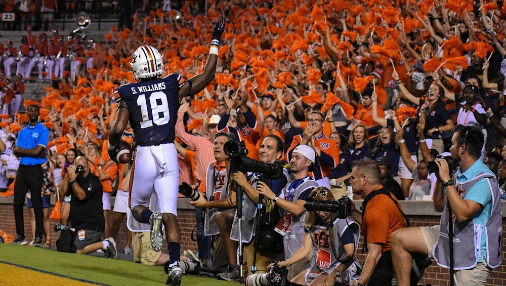 <p>Seth Williams (18) scores a touchdown during Auburn vs. Mississippi State, on Saturday, Sept. 28, 2019, in Auburn, Ala.</p>