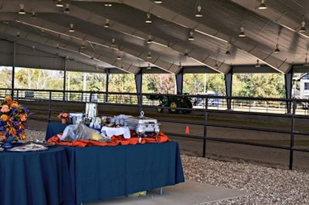 Sponsored by the College of Agriculture, the covered arena had a budget of a million dollars and was the result of private gifts from donors in support of the equestrian team. The new facility had been worked on in phases since 2006. (Raye May l Photo Editor)