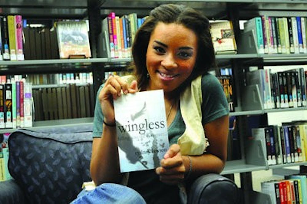Cydney Lawson, sophomore in English, is the author of "Wingless," the first book in her three-part series. (Christen Harned / ASSISTANT PHOTO EDITOR)