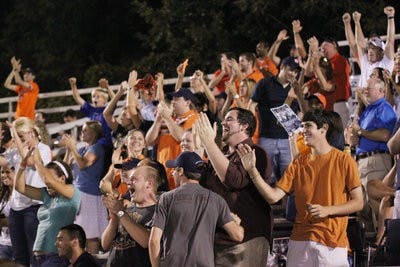 Fans cheer on the Auburn soccer team Friday night at the "Cram the Complex" event. The team beat Florida State 3-2 in double overtime. The team plays in Los Angeles tomorrow. (Emily Adams / PHOTO EDITOR)