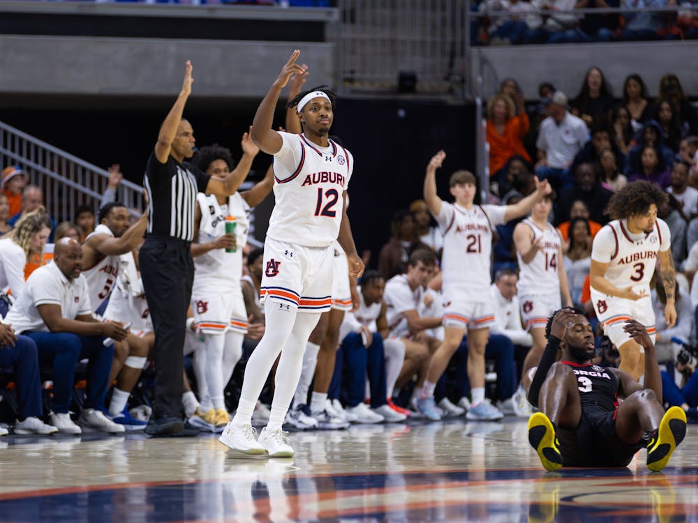 Denver Jones celebrates after hitting one of his seven three-point shots against Georgia on March 9, 2024