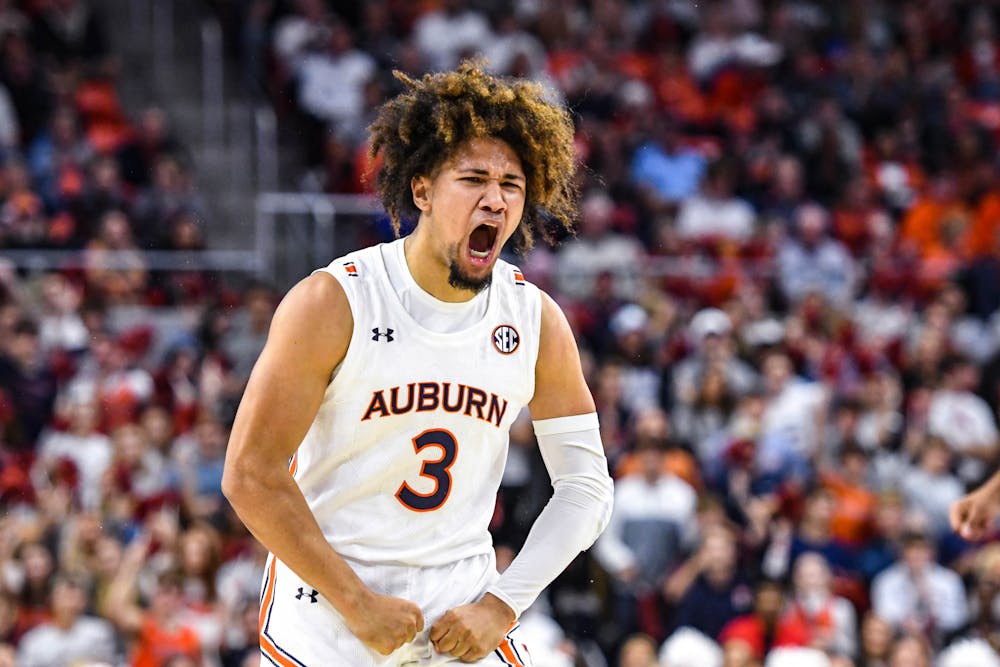 <p>Auburn guard Tre Donaldson (3) lets out a scream after hitting a two-pint jumpsuit during the first half against the University of South Florida in Neville Arena on Nov. 11, 2022.</p>